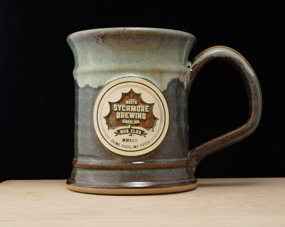 custom beer steins vs pint glasses why steins win grey fox pottery